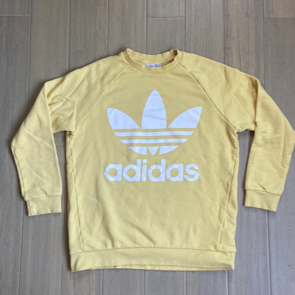 Men’s Adidas yellow crew neck.